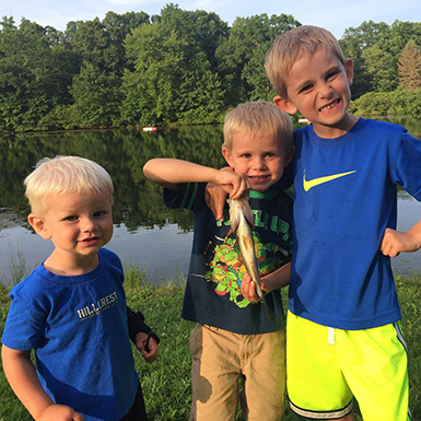kids fishing catch a bass