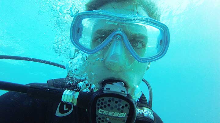 captain cody with a cressi scuba diving regulator