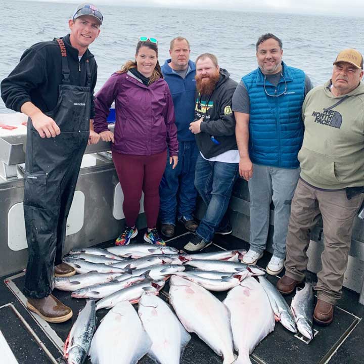 catching salmon and halibut on salmon fishing trip in alaska