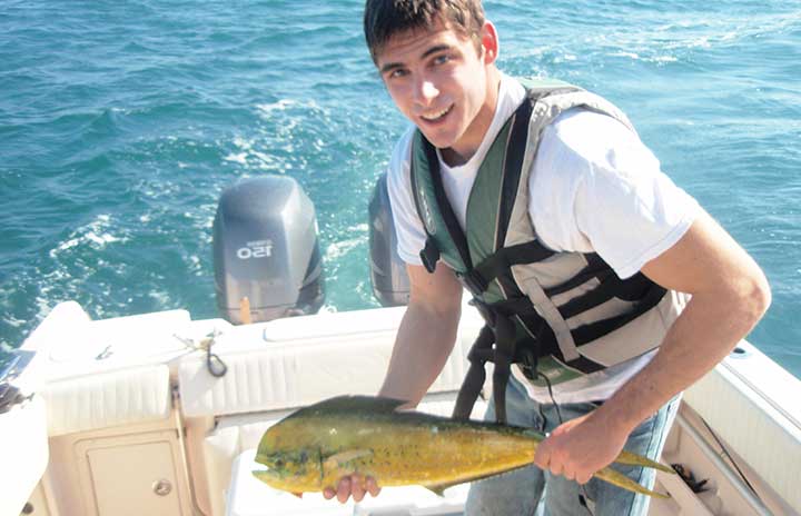 kevin catches a dorado while trolling with mahi mahi lures