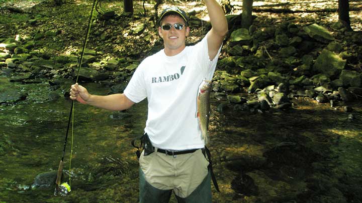 fly fishing for trout in a small stream