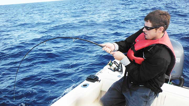 mark jigging for tuna offshore