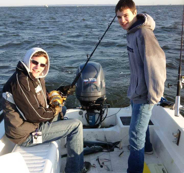 captain cody and mike fishing for bluefish